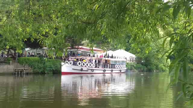 Charming outdoor event venue on a boat at Beeses Riverside Bar, perfect for celebrations.