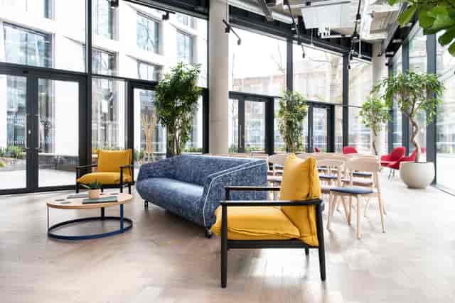 Modern event space in FORA-Southwark with natural light and casual seating for meetings.