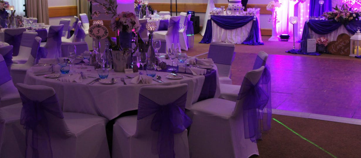 Victoria Suite at Novotel Bristol: elegant event space with purple accents for weddings.