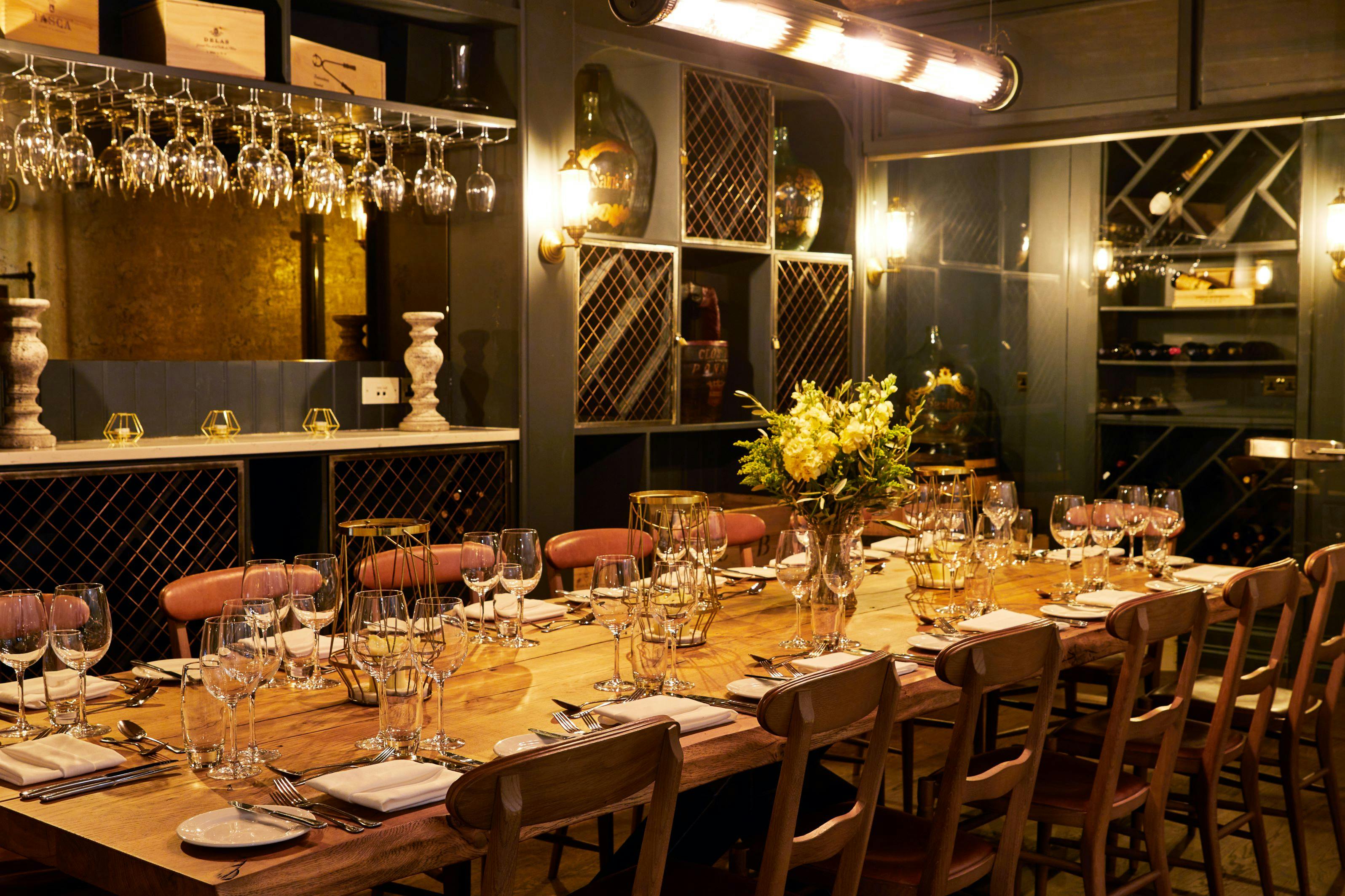 Elegant dining table in The Wine Cellar, perfect for intimate gatherings and corporate dinners.