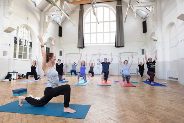Group yoga session at Milford Hall, ideal for wellness retreats and team-building events.