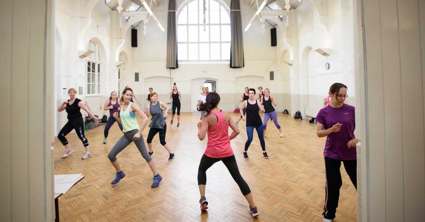 Vibrant group fitness class at Milford Hall, ideal for wellness retreats and team-building.