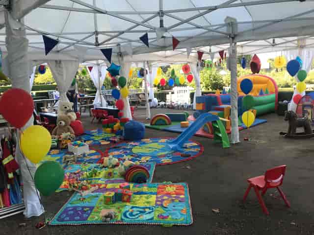 Colorful children's event space with bouncy castle for birthday parties in Hyde Park.