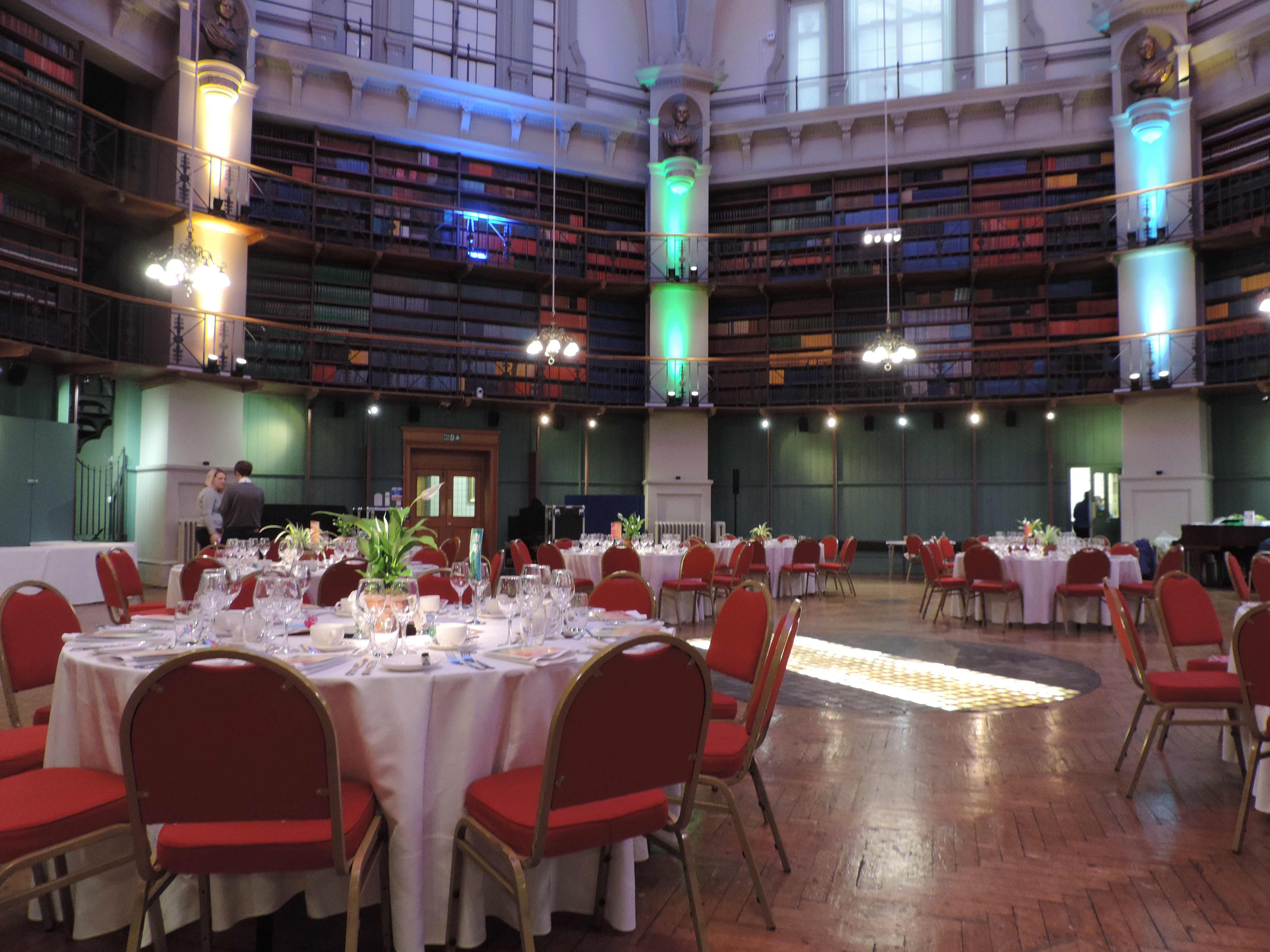 Elegant Octagon venue with round tables, ideal for corporate events and formal dinners. - Banner
