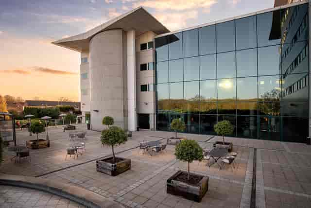 Longley Suite at Arora Hotel Gatwick, modern venue for corporate events with glass facades.