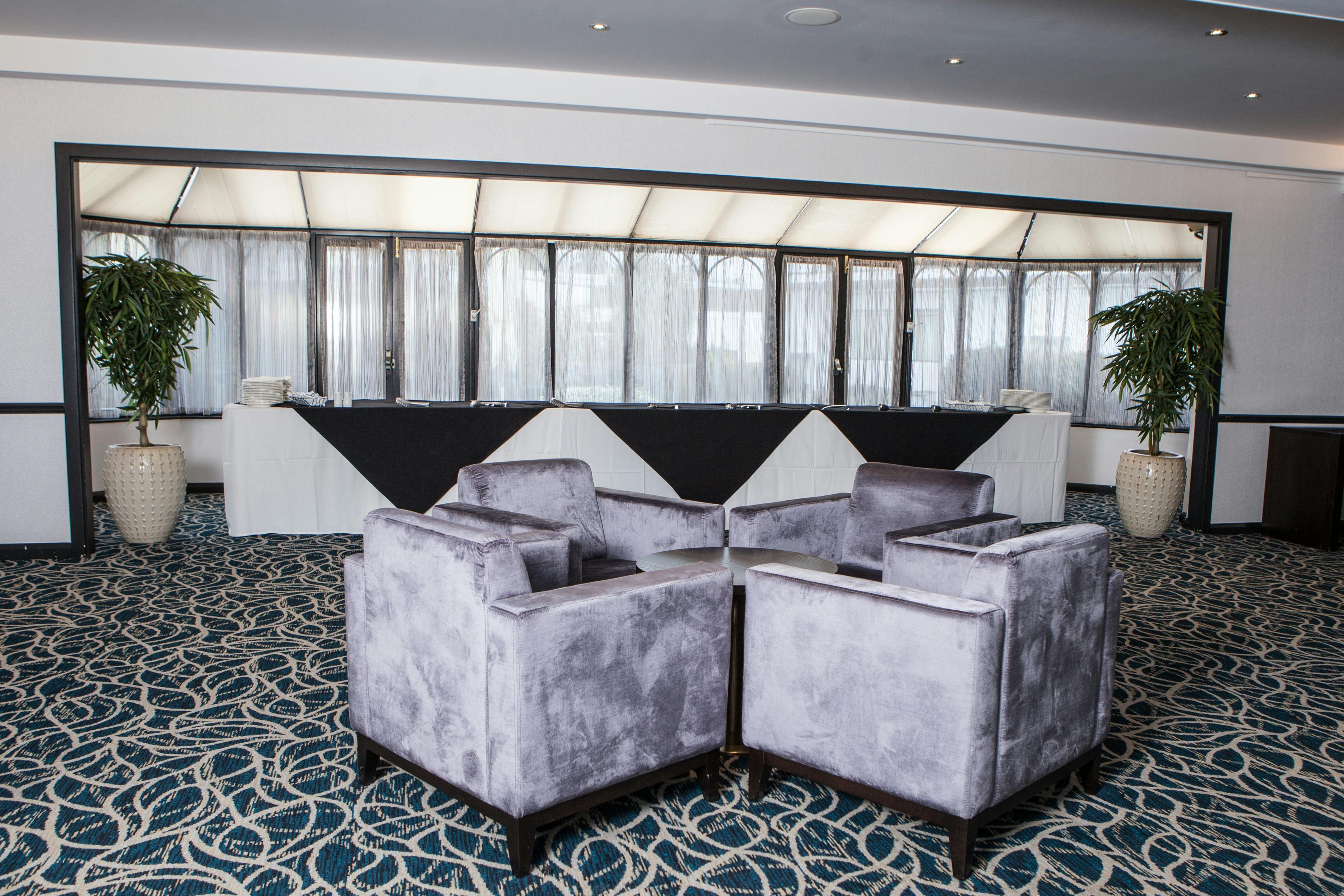 Grand Ballroom at Crowne Plaza Felbridge with modern seating for networking events.
