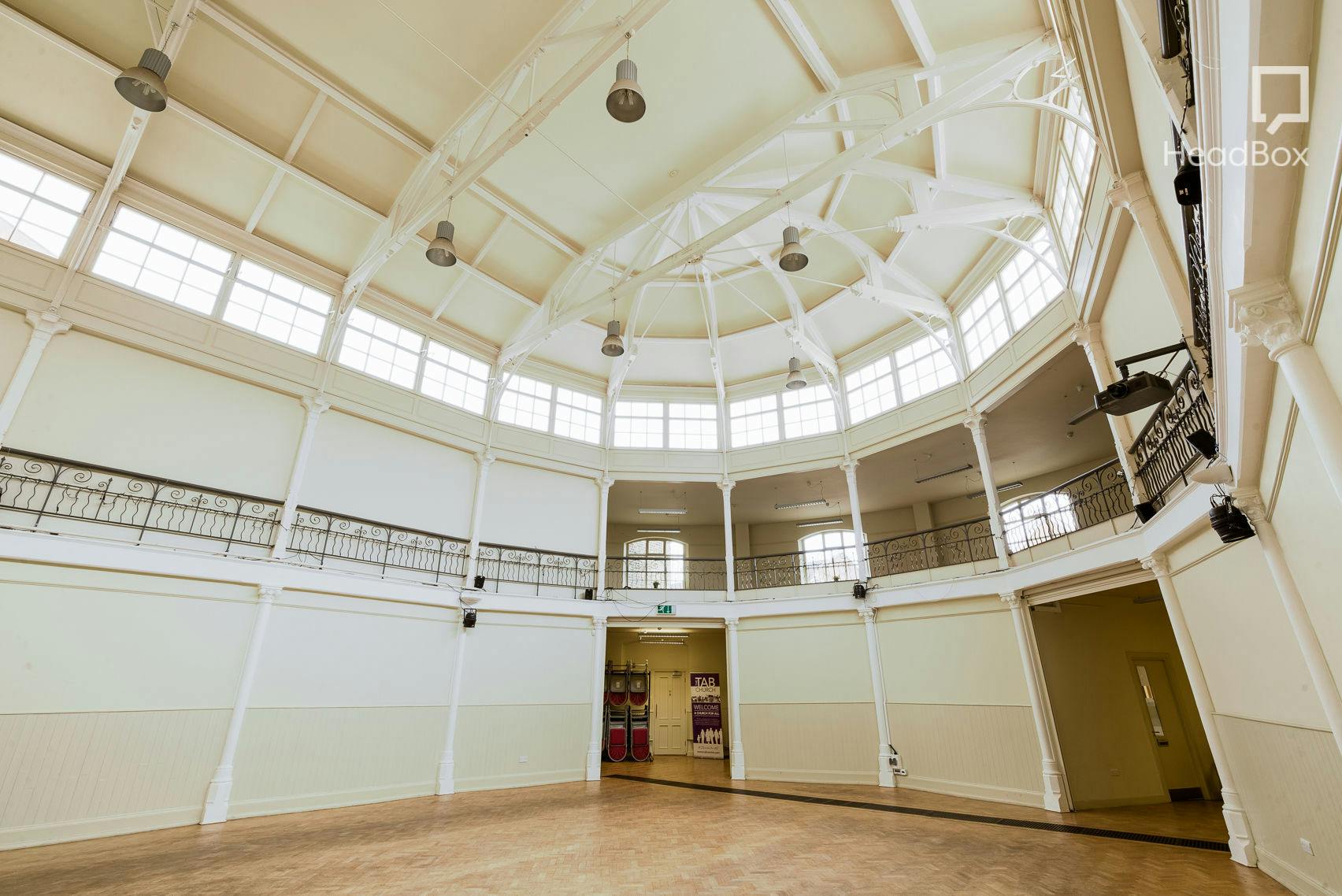 Spacious Tab Centre lecture hall with high ceilings, perfect for meetings and workshops.