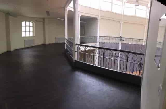 Spacious Tab Centre lecture hall with balcony, ideal for conferences and networking events.