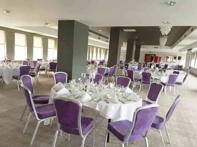 Forest Suite at Mercure Bristol: elegant event space with round tables, ideal for weddings and corporate events.
