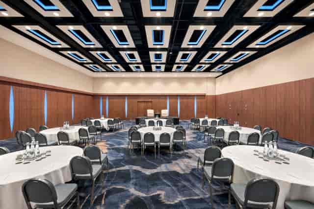 Modern ballroom at Mercure London Earls Court with stage lighting for banquet and conference events.