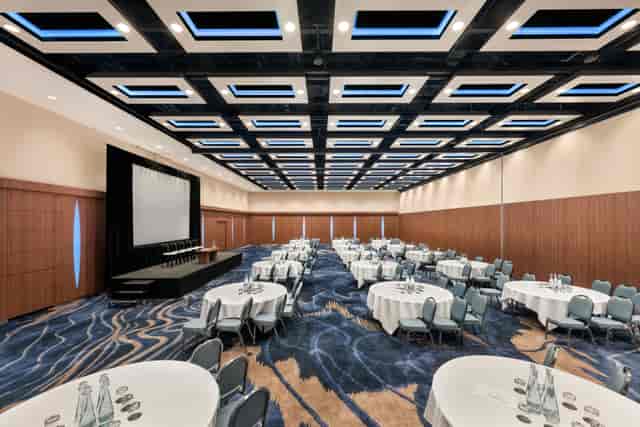 Corporate banquet ballroom at Mercure London Earls Court with stage and AV for events.