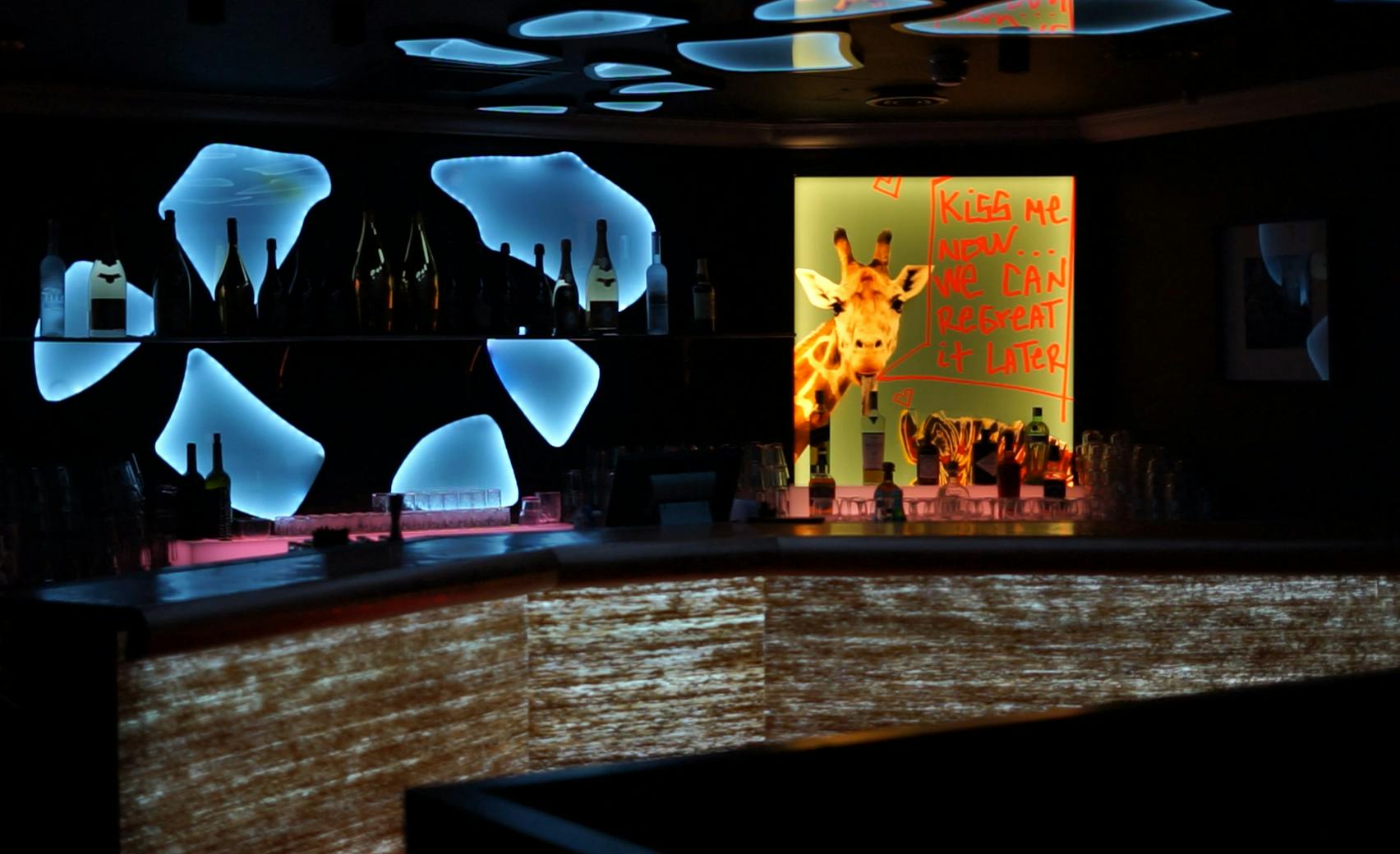 Stylish bar at Sumosan Twiga with vibrant decor, perfect for networking events.