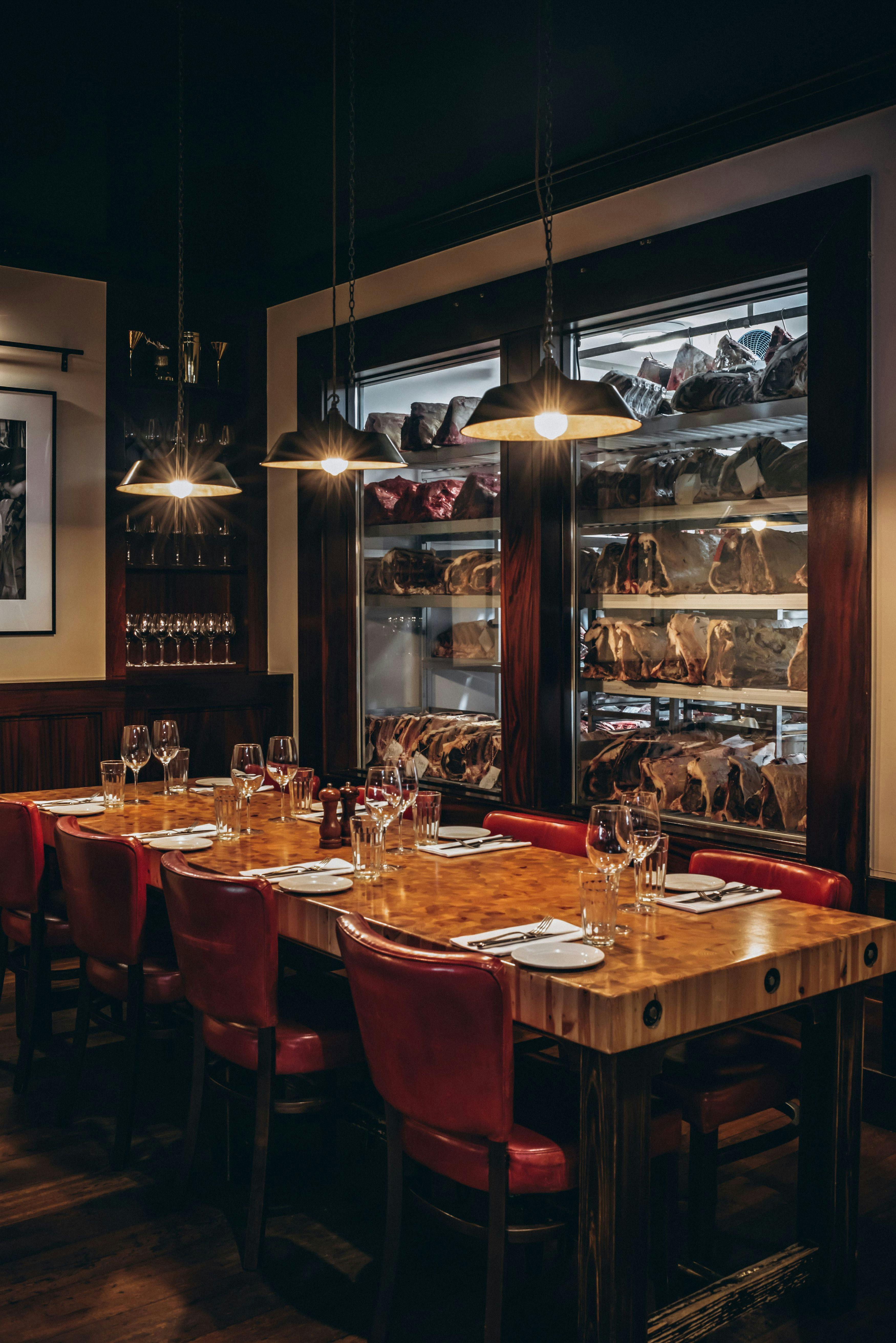 Private dining room at Goodman - City with elegant table setting for upscale events.