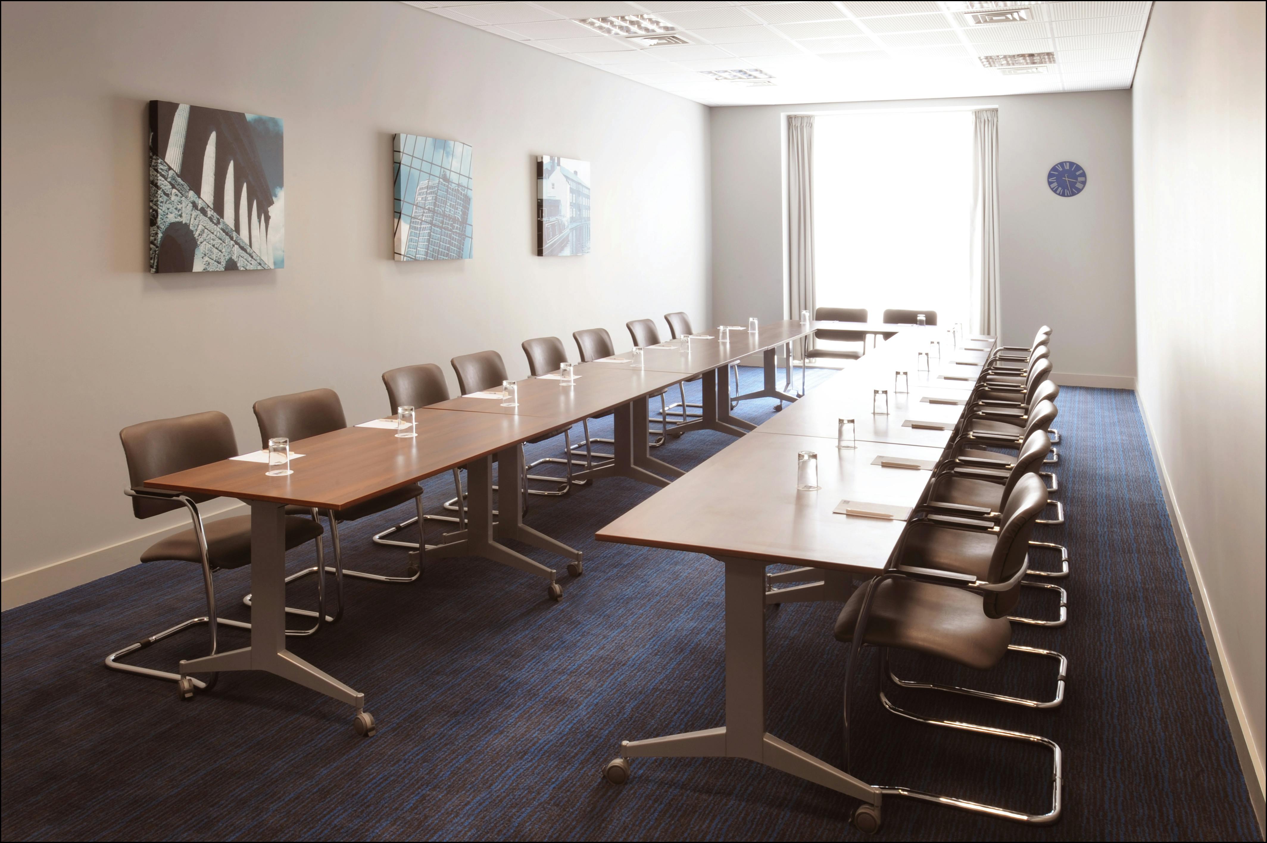 Meeting Room 2 at Holiday Inn Express, U-shaped tables for corporate meetings.