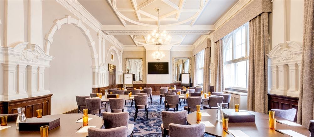 Council Room at Hotel Indigo Durham, elegant decor, ideal for corporate meetings.