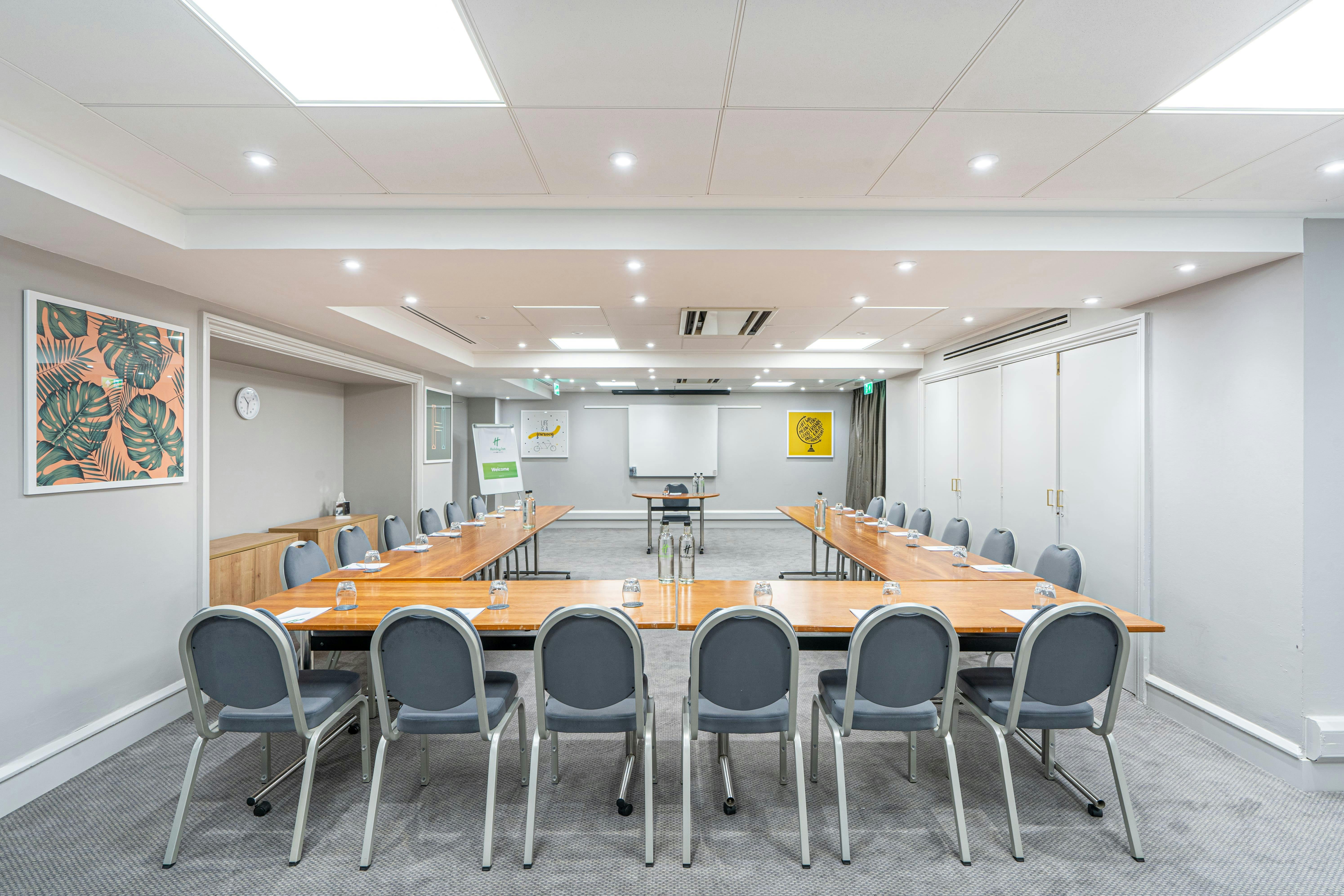 Langley Suite meeting room at Holiday Inn, modern design for corporate events.