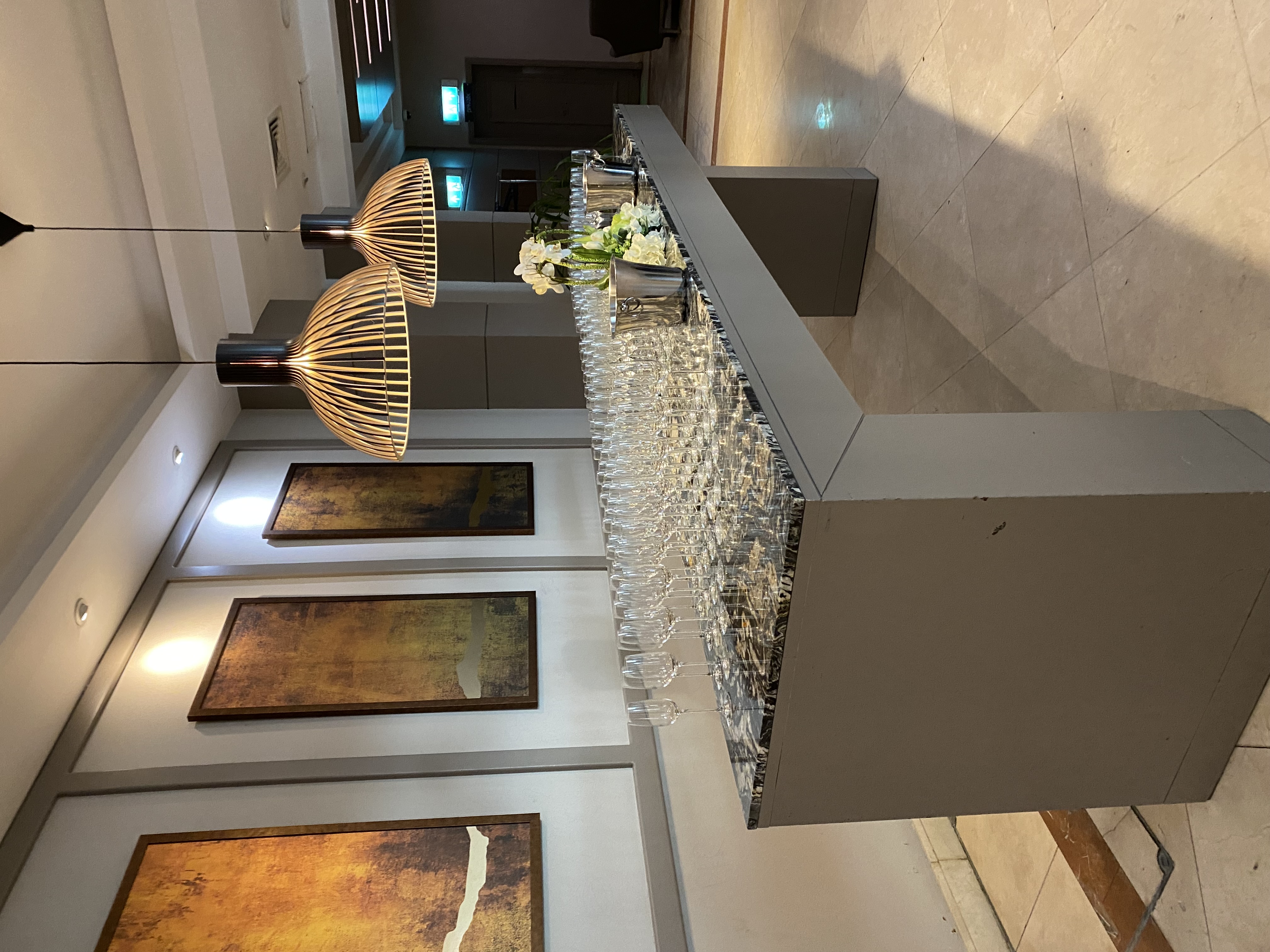 Ivy Suite at The Crown London Hotel, modern event space with elegant decor and glassware. - Banner