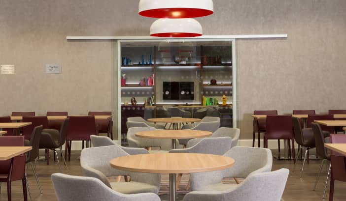 Modern meeting space in Staybridge Suites Birmingham, ideal for networking events.