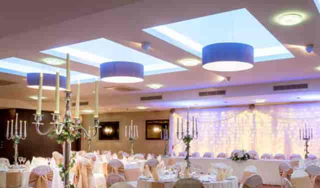 Tyrconnell Suite at Maldron Hotel Derry, elegant wedding venue with chandeliers.
