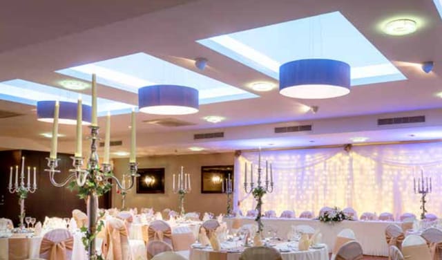 Tyrconnell Suite at Maldron Hotel Derry, elegant wedding venue with chandeliers.