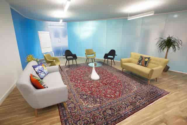 Ariane in a vibrant meeting space at Wallacespace Spitalfields for brainstorming sessions.