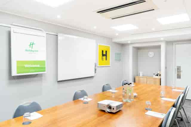 Small Boardroom at Holiday Inn Hemel Hempstead, equipped for professional meetings and presentations.