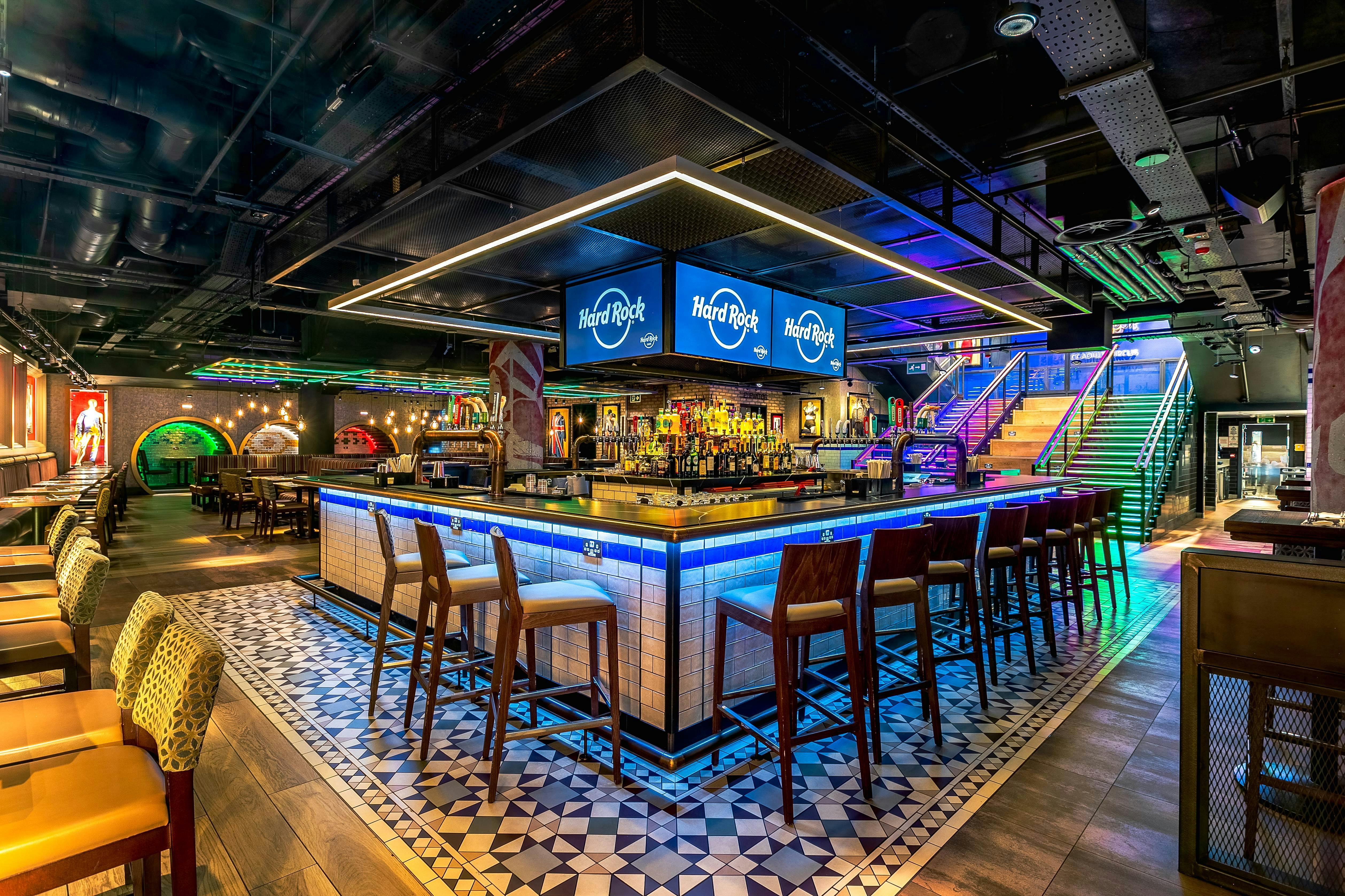 Vibrant Hard Rock Cafe Piccadilly Circus bar, ideal for networking events and receptions.