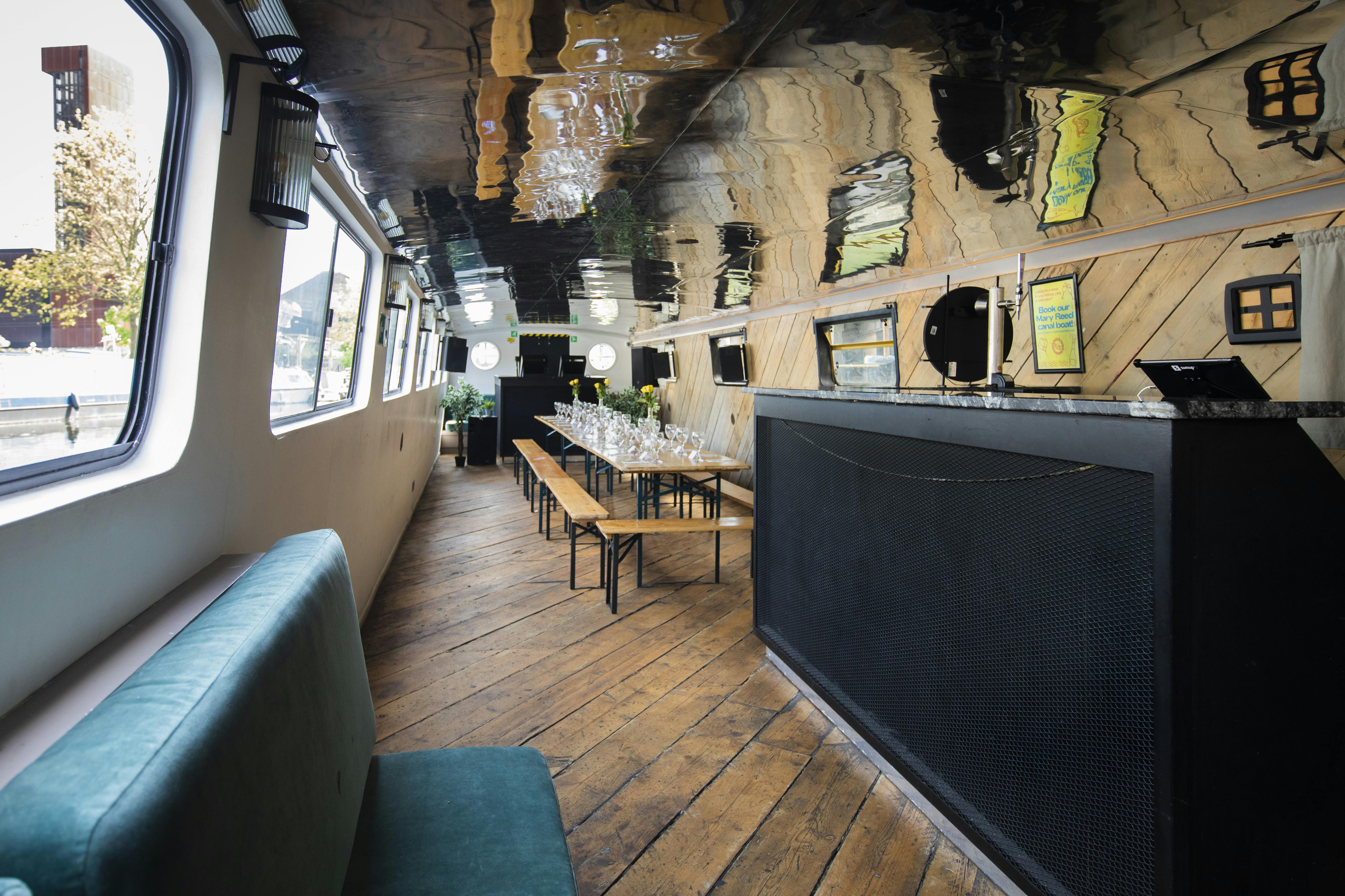 Modern event space with sleek bar and unique ceiling design at Mary Read Boat, Studio 9294.