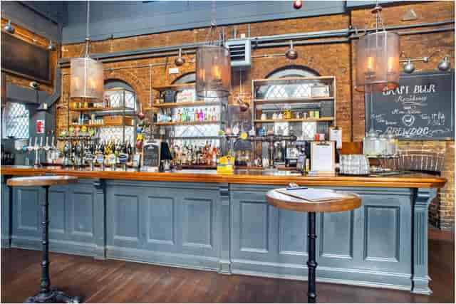 Stylish bar area in The Phoenix, Denmark Hill for networking events and cocktail receptions.