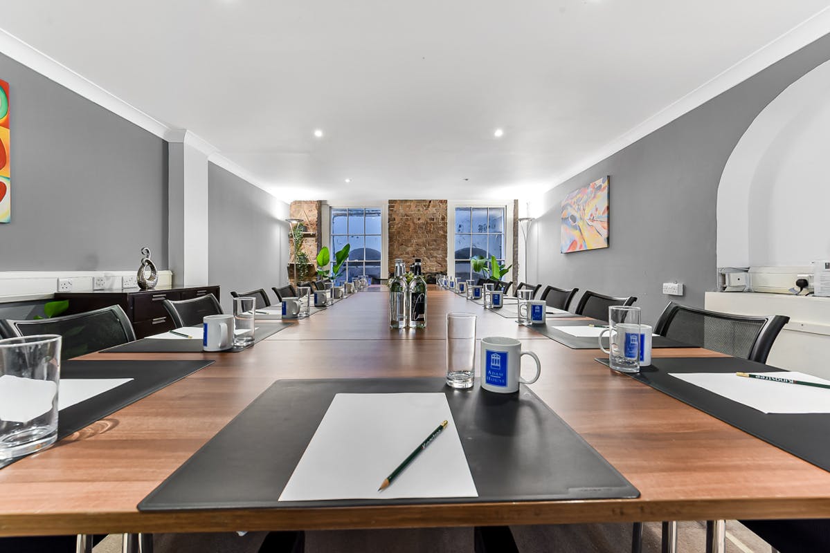 Library Room in Adam House with polished table, perfect for corporate meetings and workshops.