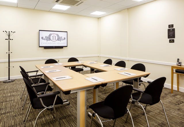 Meeting room at Cavendish Square with central table, ideal for corporate events and presentations.