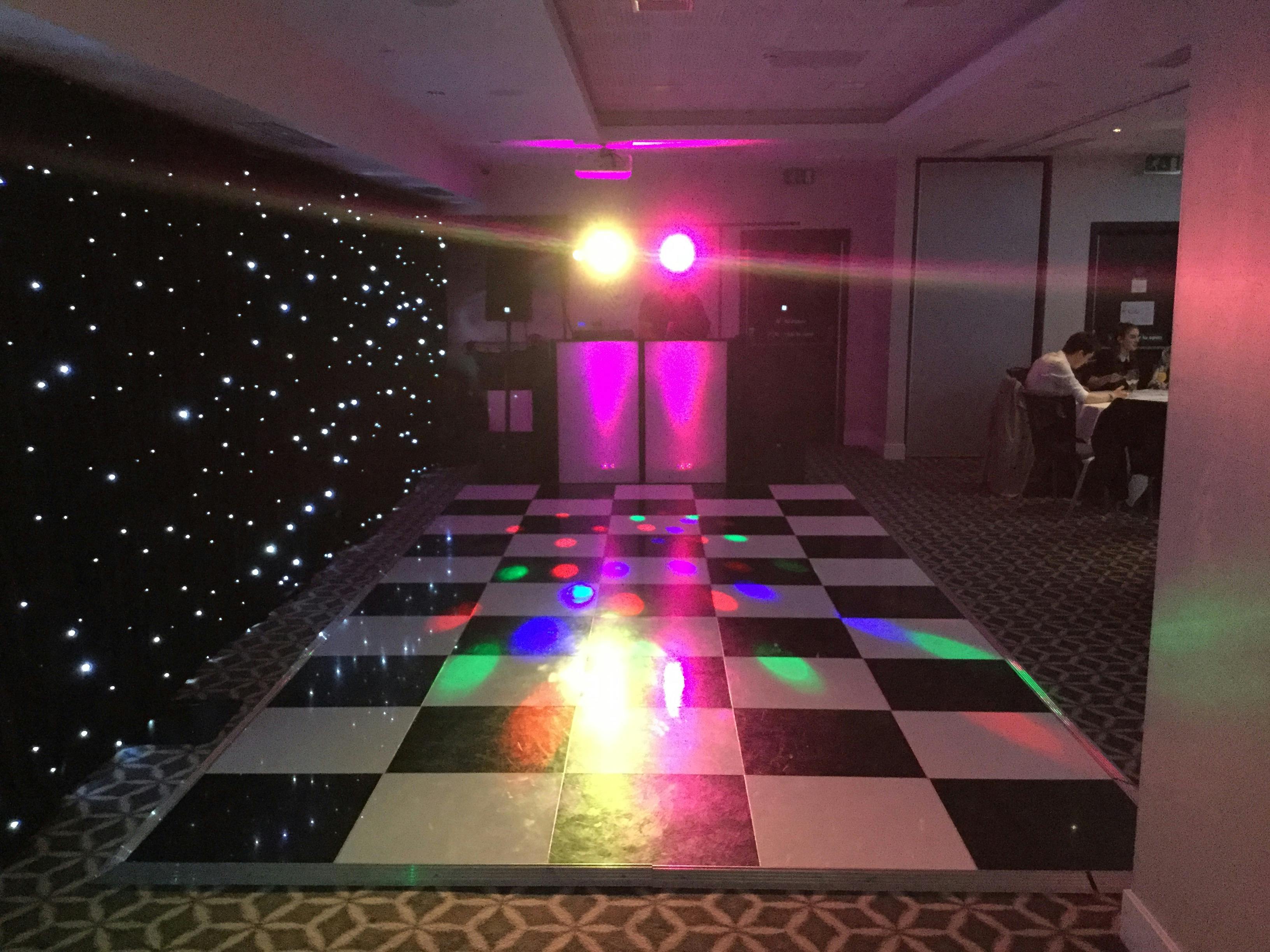 Ambassador Suite at Holiday Inn Southend with checkered dance floor for events and celebrations.
