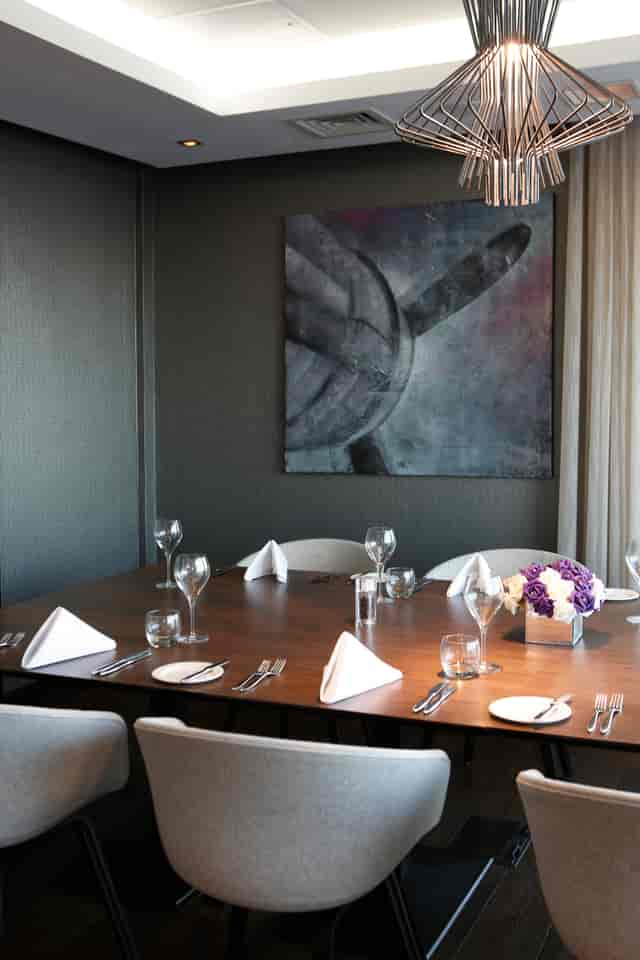 Boardroom at Holiday Inn Southend with elegant table setting for corporate meetings.