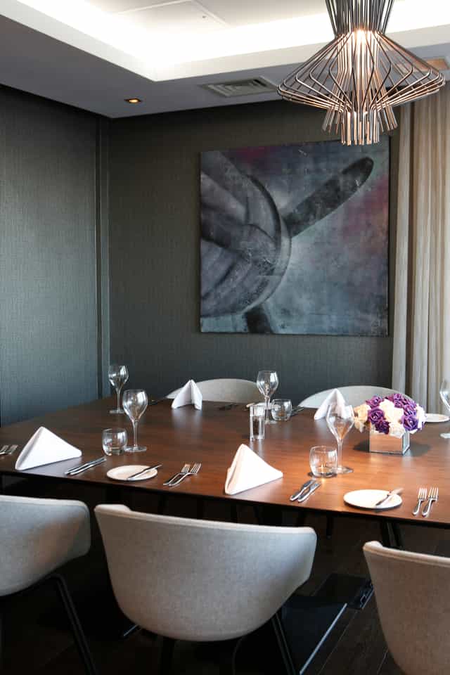 Boardroom at Holiday Inn Southend with elegant table setting for corporate meetings.