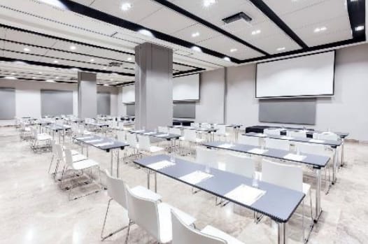 Modern meeting room at Novotel Center, ideal for conferences and workshops.