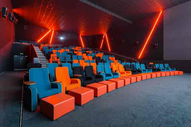 Modern auditorium with tiered seating at The Light Cinema Stockport for events and presentations.
