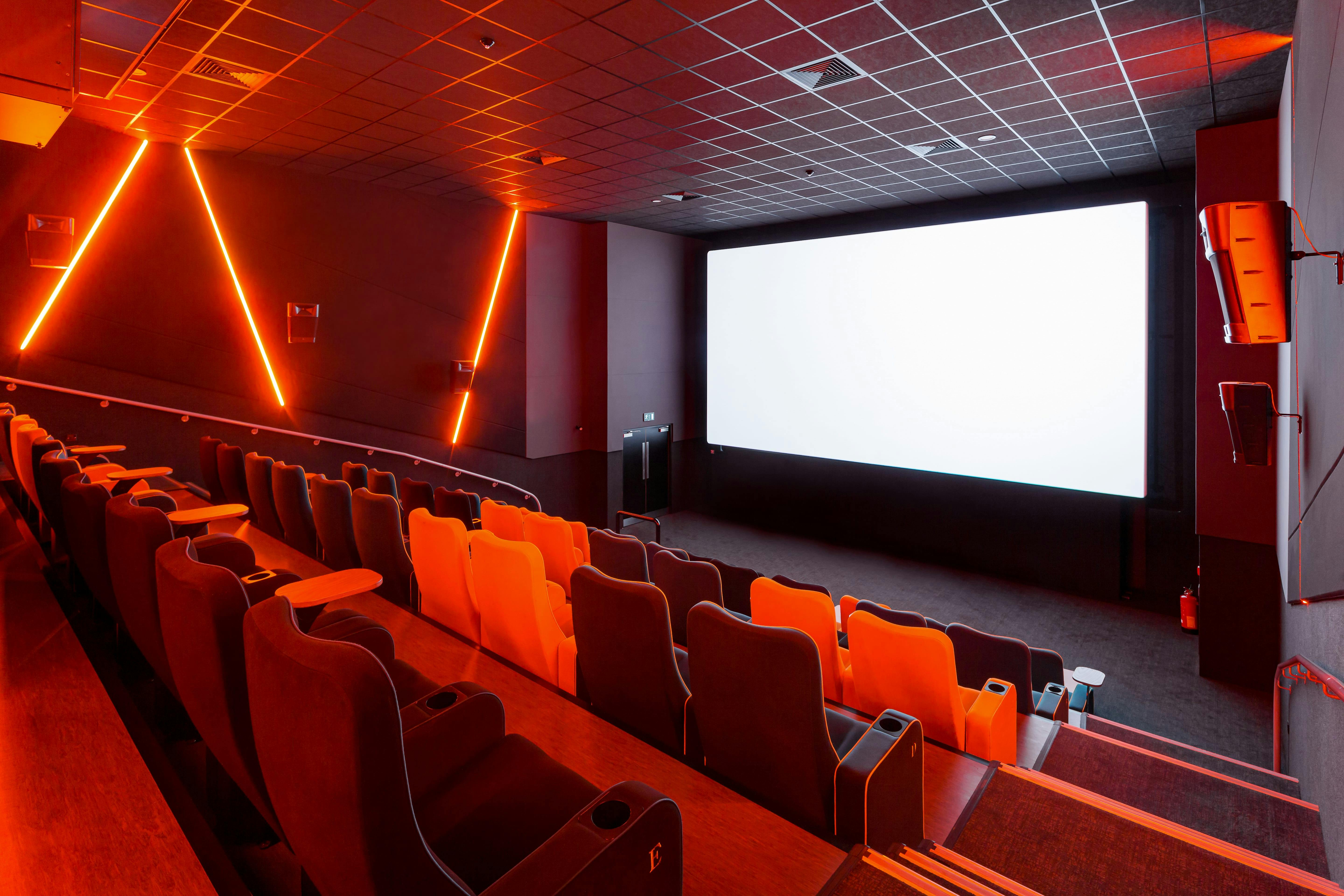 Modern cinema auditorium with sleek design, ideal for film screenings and presentations.