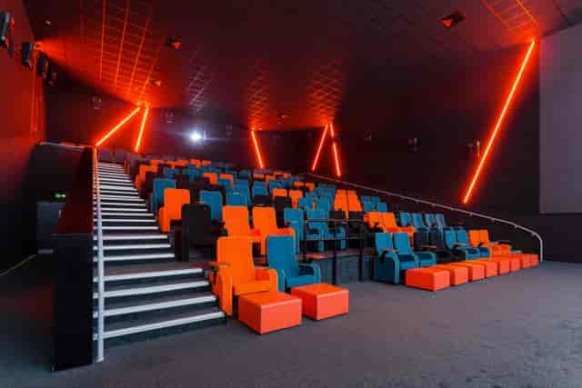Modern event space in The Light Cinema Stockport with vibrant seating for presentations.