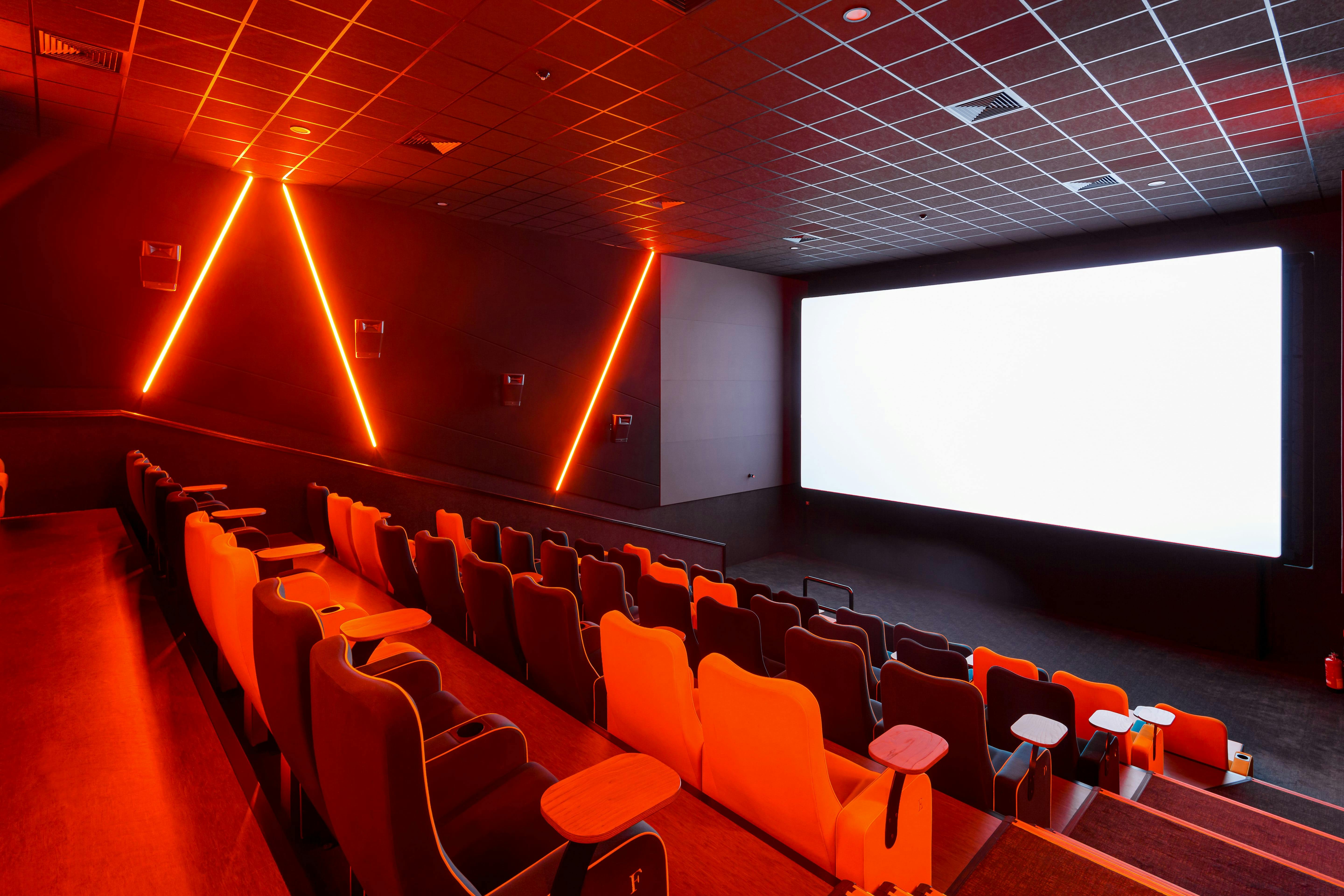 Modern cinema auditorium with sleek seating, ideal for film screenings and events.