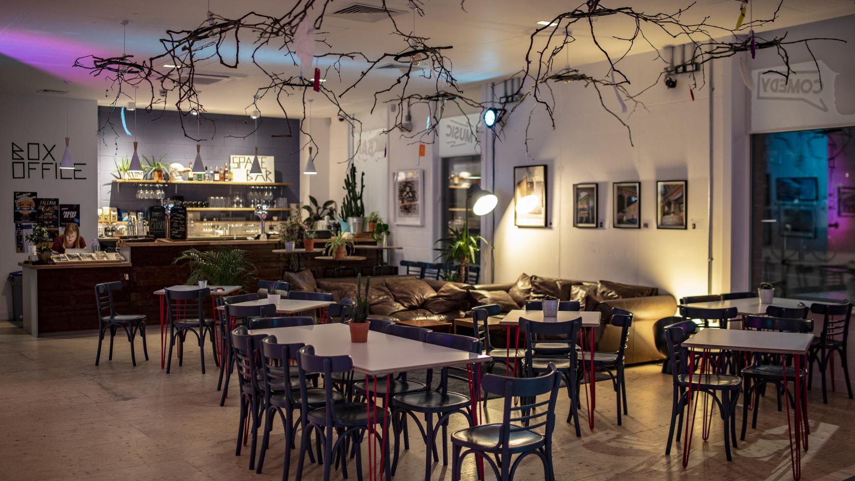 Versatile event space in Streatham with casual seating for networking and gatherings. - Banner
