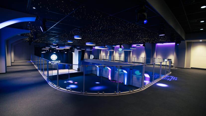 Modern event space with starry ceiling, ideal for corporate and social gatherings.