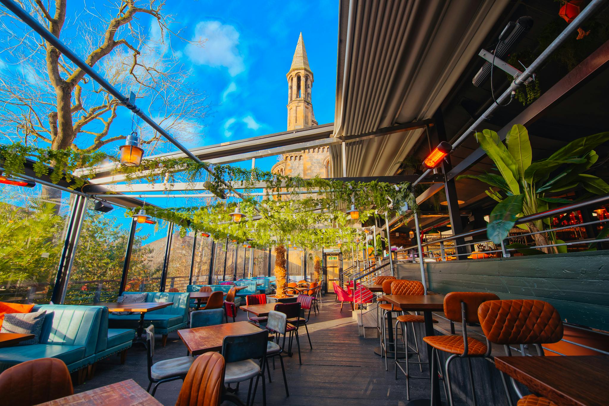 Vibrant event space at The Terrace, Revolution Aberdeen with colorful seating and natural light.