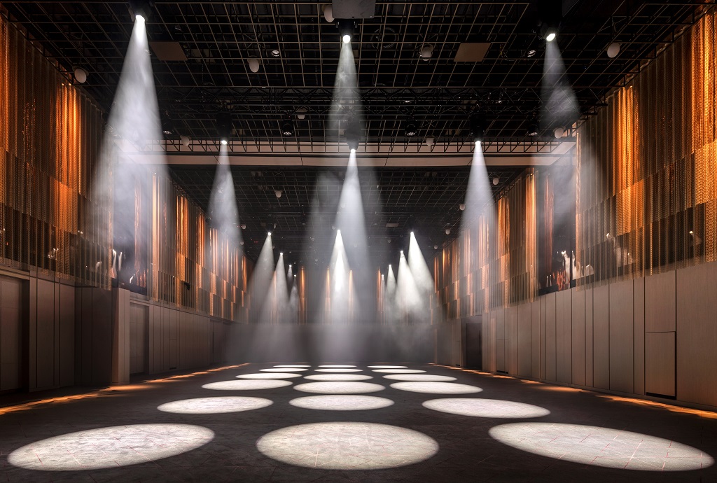 Ballroom at The Londoner with dramatic lighting, ideal for conferences and galas. - Banner