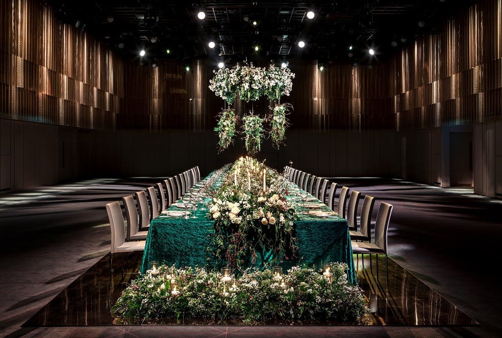 Elegant banquet table with floral arrangements in Ballroom B, perfect for weddings and galas.