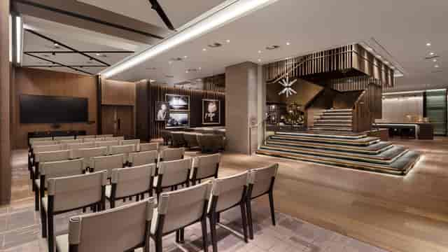 National Gallery event space with tiered seating for corporate presentations and networking.