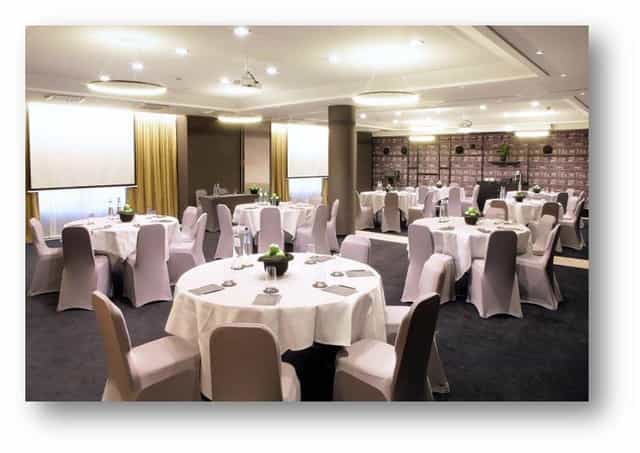 Elegant event space at Sofitel Brussels for corporate meetings and banquets.