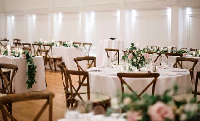 Elegant Lord Stanley Ballroom setup with floral centerpieces for weddings and events.