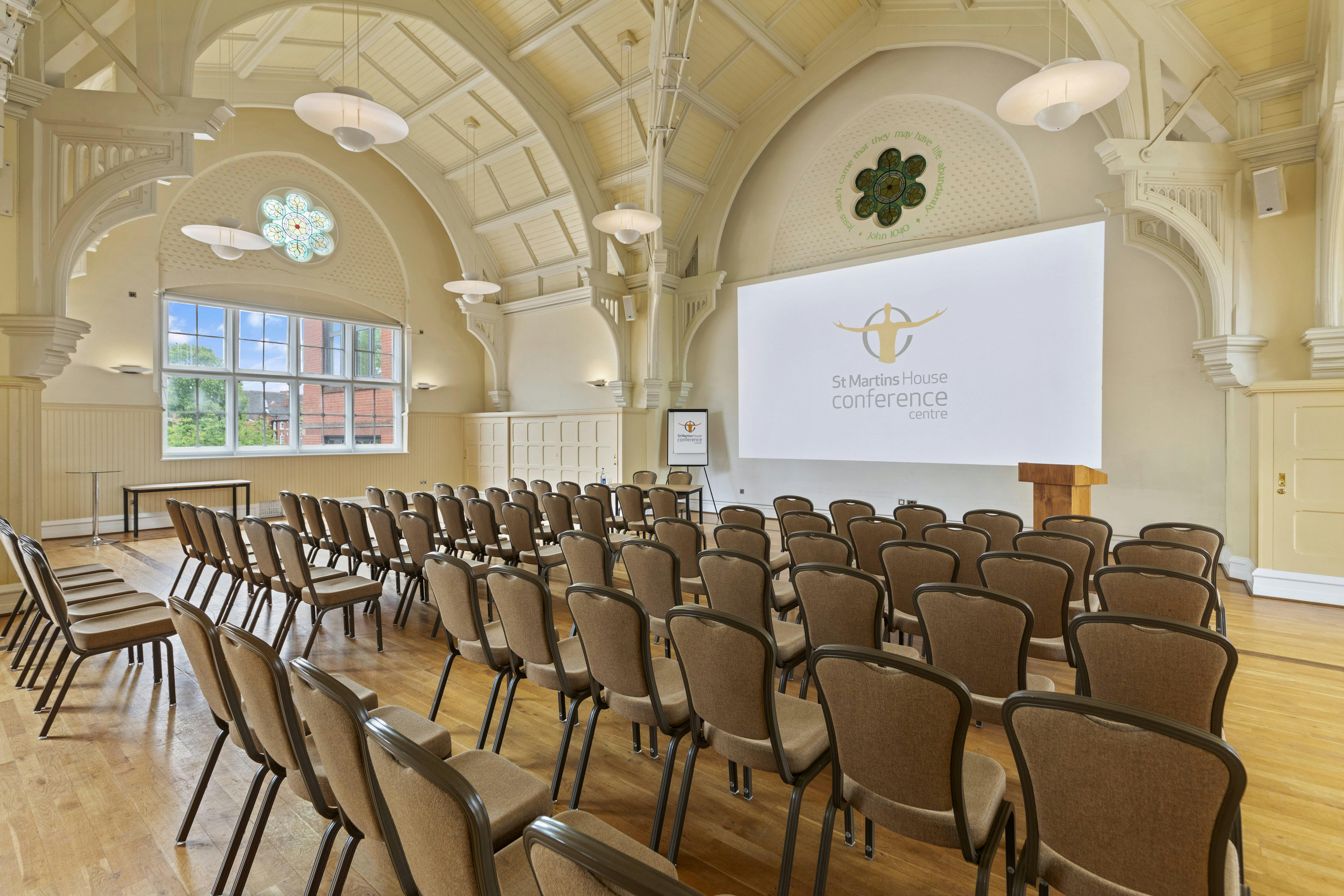 Grand Hall at St Martins House: elegant conference room with arranged chairs for events.