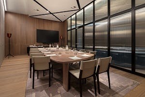 Modern conference room at Serpentine Galleries with oval table for meetings and presentations.