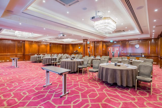 Elegant meeting room at Radisson Blu Heathrow, perfect for corporate events and workshops.
